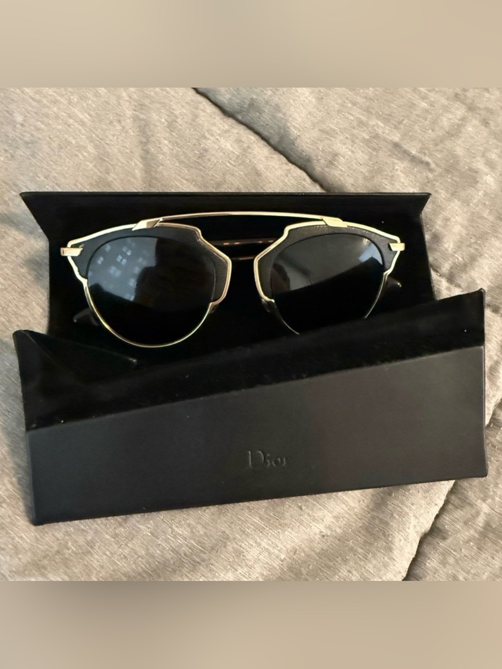 Dior “So Real” sunglasses with case
